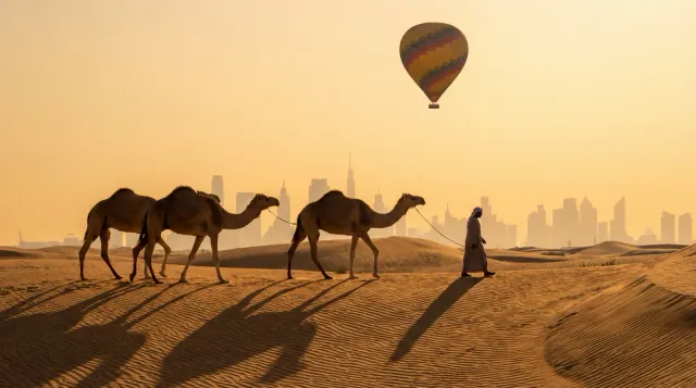 Camel caravan crossing the dunes as seen from the balloon